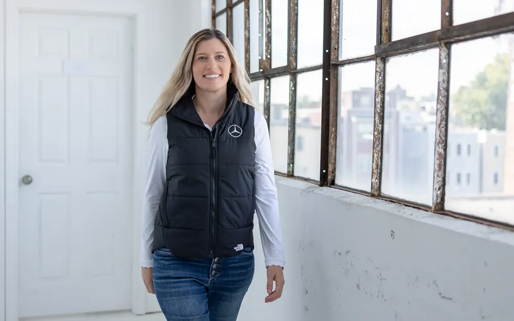 Custom The North Face corporate apparel and merchandise, including jackets and backpacks.
