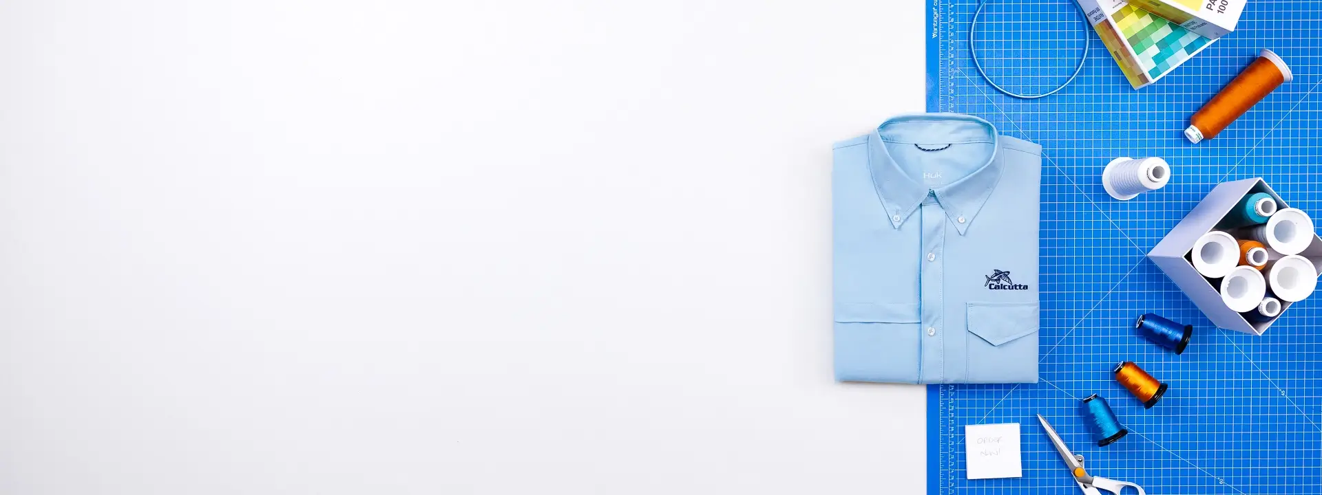 Custom HUK clothing and embroidered shirts create standout corporate apparel.