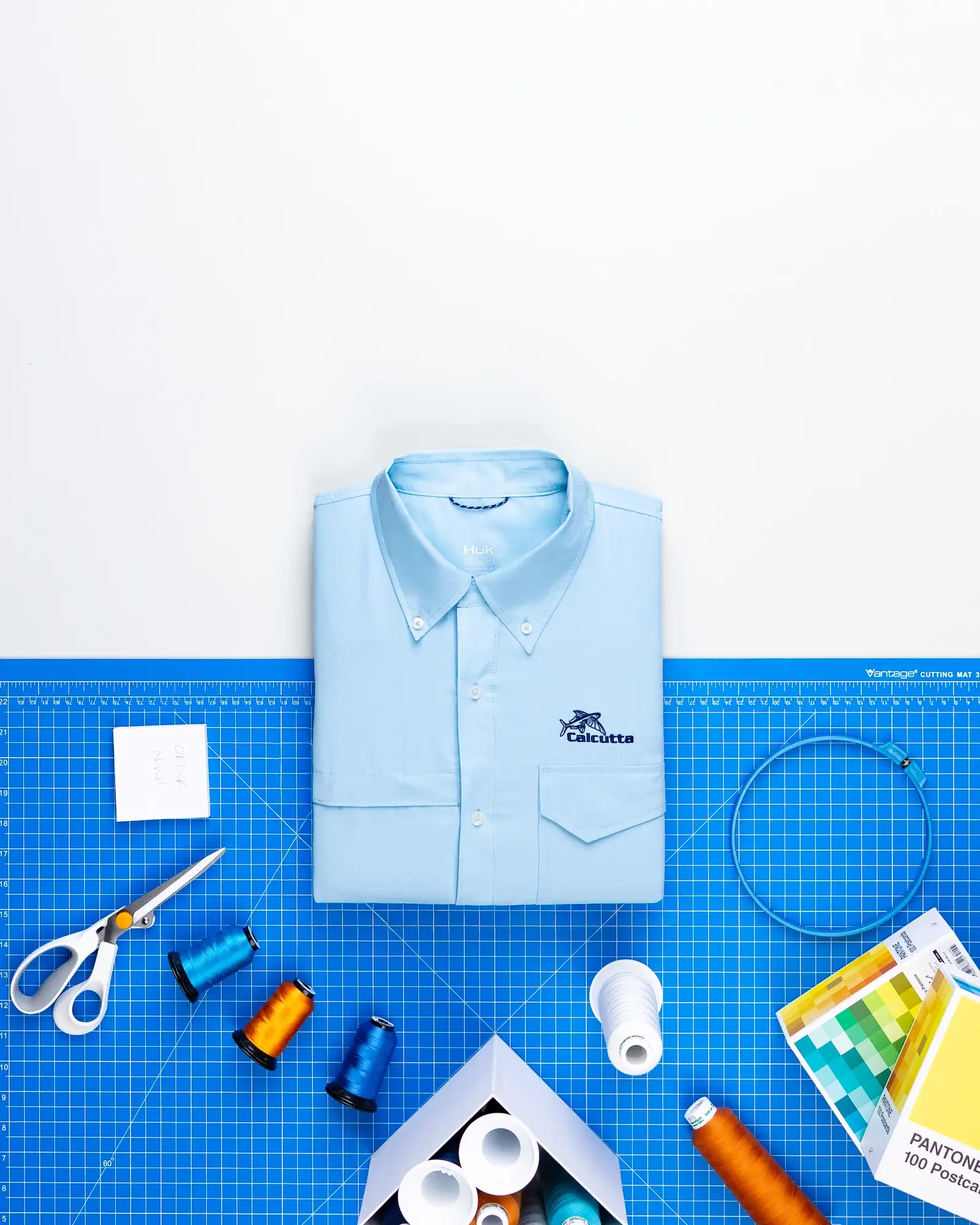 Custom HUK clothing and embroidered shirts create standout corporate apparel.