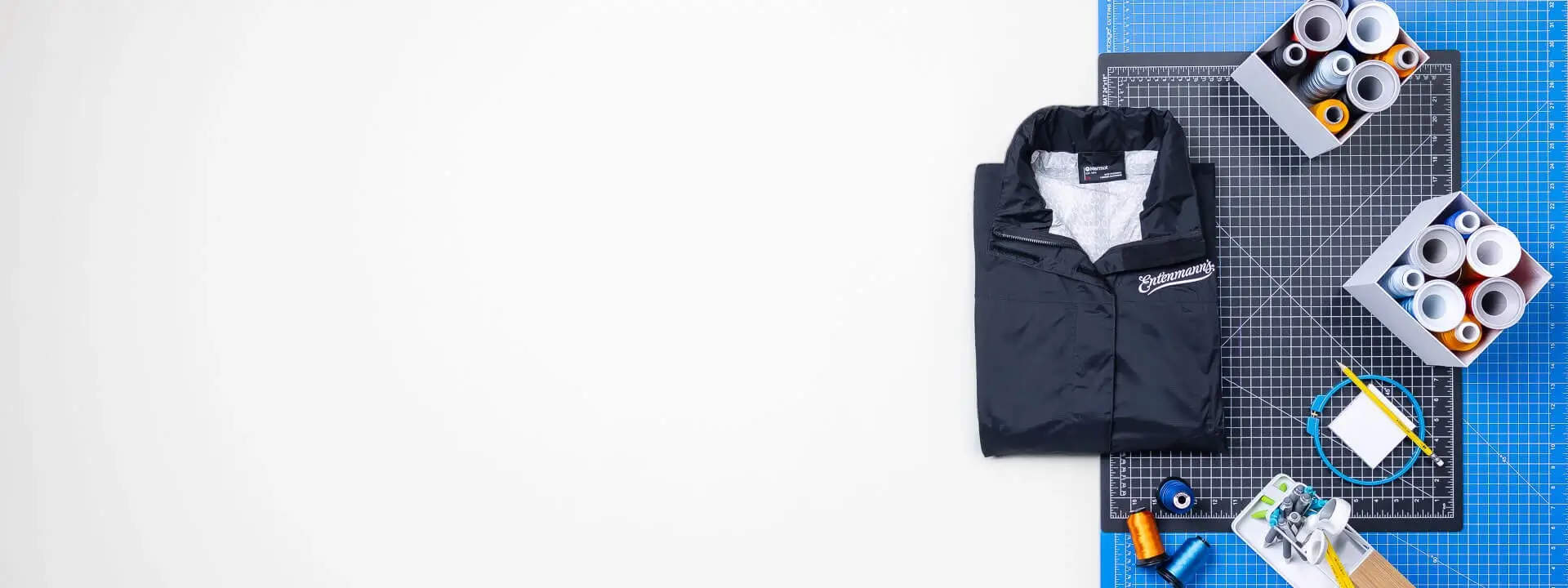 Custom Embroidered Apparel. Helly Hansen Raincoats. Helly Hansen Duffle Bags.