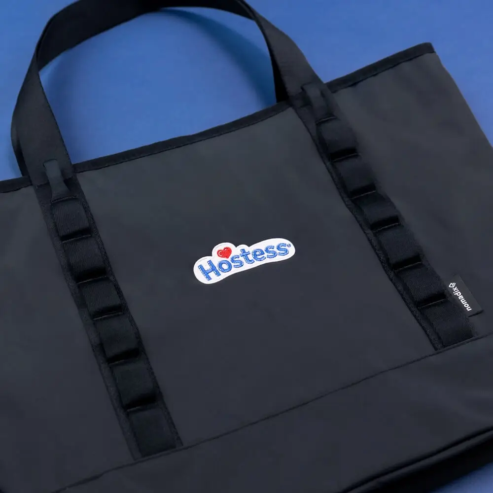Luxury corporate gifts including branded tote bags and personalized backpacks. Luxury corporate gifts including branded tote bags and personalized backpacks.
