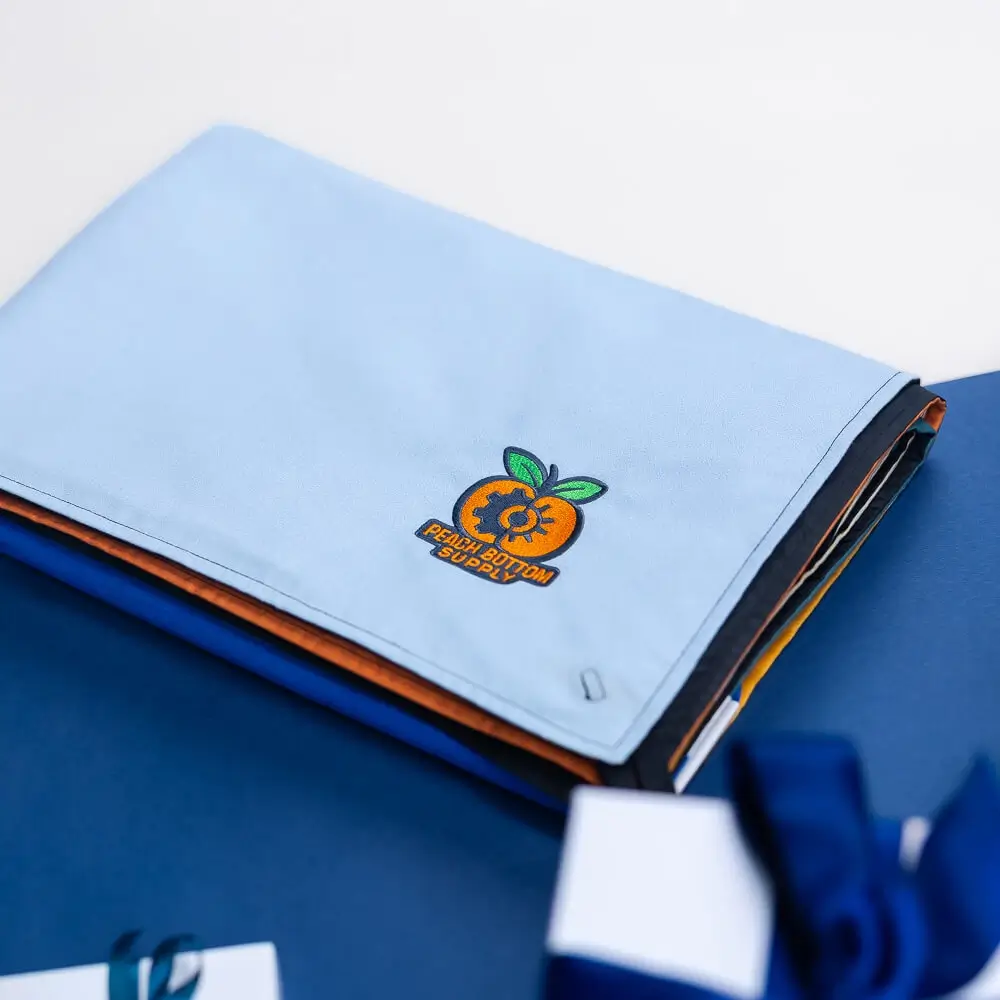 Custom travel bags and embroidered towels make unique corporate gifts shine. Custom travel bags and embroidered towels make unique corporate gifts shine.