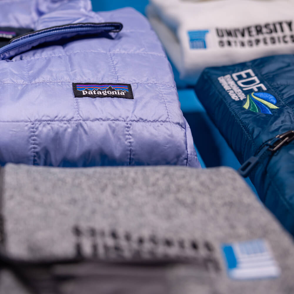 Patagonia custom employee gifts. Embroidered Patagonia. Corporate swag.